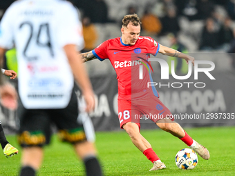 Grigoras Alexandru Pantea is in action during the Romanian Superliga match between Universitatea Cluj and FCSB at Cluj Arena in Cluj, Romani... by Flaviu Buboi/NurPhoto