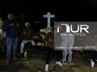 On November 1, 2025, in the Sierra Madre Sur region of Mexico, residents attend a Day of the Dead procession at homes. They carry a skull ov... by Gerardo Vieyra/NurPhoto