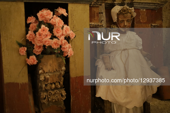 A view inside a chapel in the Sierra Madre Sur mountains of Mexico, where dozens of people gather for a Day of the Dead procession carrying... by Gerardo Vieyra/NurPhoto