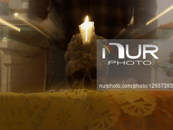 A view of a skull inside a chapel in the Sierra Madre Sur of Mexico, where dozens of people gather for a Day of the Dead procession. They pl... by Gerardo Vieyra/NurPhoto