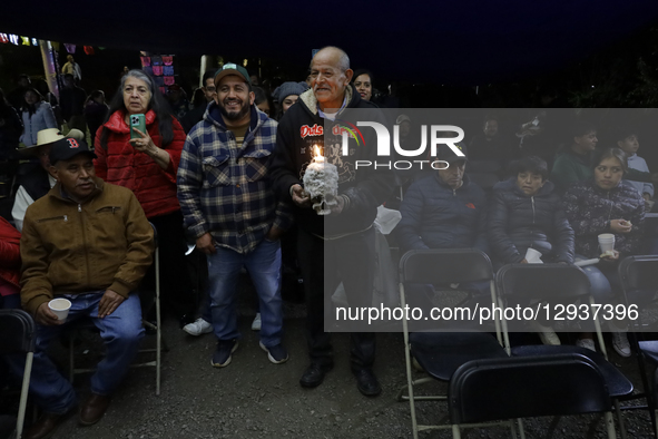 Residents of the Sierra Madre Sur region of Mexico hold a Day of the Dead procession using a skull over 300 years old on November 1 and 2, 2... by Gerardo Vieyra/NurPhoto