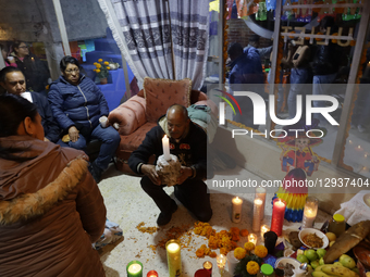 On November 1, 2025, in the Sierra Madre Sur region of Mexico, residents attend a Day of the Dead procession at homes. They carry a skull ov... by Gerardo Vieyra/NurPhoto