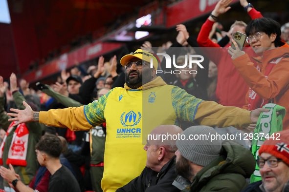 Forest supporters gesticulate towards the Manchester Utd supporters during the Premier League match between Nottingham Forest and Manchester... by MI News/NurPhoto