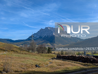 High-voltage electricity pylons and power lines stretch across the valley floor, supplying power and energy to the region in Lermoos, Tyrol,... by Michael Nguyen/NurPhoto
