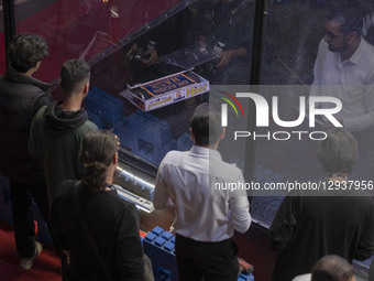 Two robots compete in the Robot Warriors competition during Iran's 2025 Tech Olympics at Pardis Technology Park, east of Tehran, Iran, on Oc... by Morteza Nikoubazl/NurPhoto