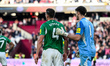 Goalkeeper Nick Pope of Newcastle puts his arm around Sven Botman of Newcastle after an ow...