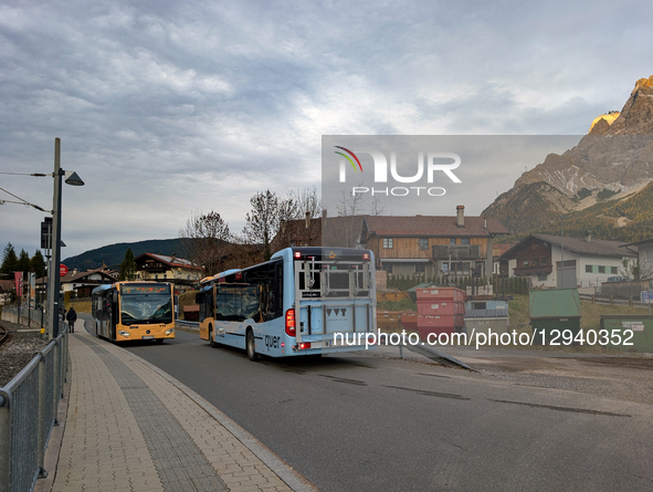 Buses from the regional network are at the bus station area next to the Ehrwald Zugspitzbahn train station in Ehrwald, Tyrol, Austria, on No... by Michael Nguyen/NurPhoto