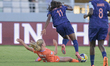 #15 Hubert K. (Midfielder) of Netherlands U-17 contrasts with #11 Morissaint (Forward) of...