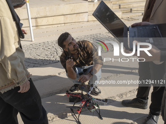Iranian drone specialists check their drone before participating in a competition during Iran's 2025 Tech Olympics at Pardis Technology Park... by Morteza Nikoubazl/NurPhoto