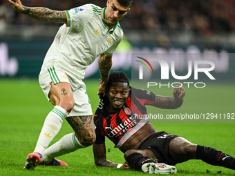 Gianluca Mancini of AS Roma and Rafael Leao of AC Milan are in action during the Italian Serie A football match between AC Milan and AS Roma... by Tiziano Ballabio/NurPhoto