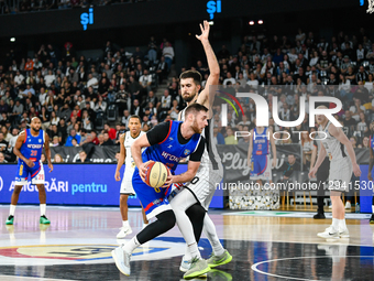Nikola Popovic and Dusan Miletic are in action during the U-BT Cluj-Napoca vs. Igokea M:Tel game in the ABA League, held at BT Arena in Cluj... by Flaviu Buboi/NurPhoto
