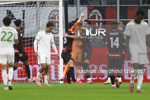 Mike Maignan, Matteo Gabbia, and Davide Bartesaghi play during the Serie A match between AC Milan and AS Roma at Giuseppe Meazza stadium in... by Mairo Cinquetti/NurPhoto