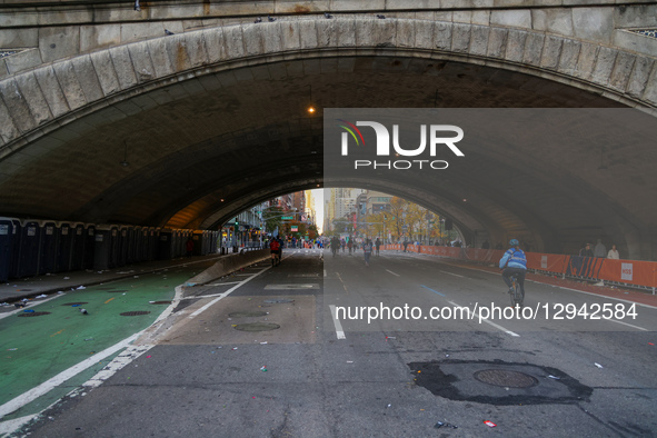 People look up First Avenue near the completion of the 2025 New York City Marathon in the Upper East Side neighborhood of New York, New York... by Gordon Donovan/NurPhoto