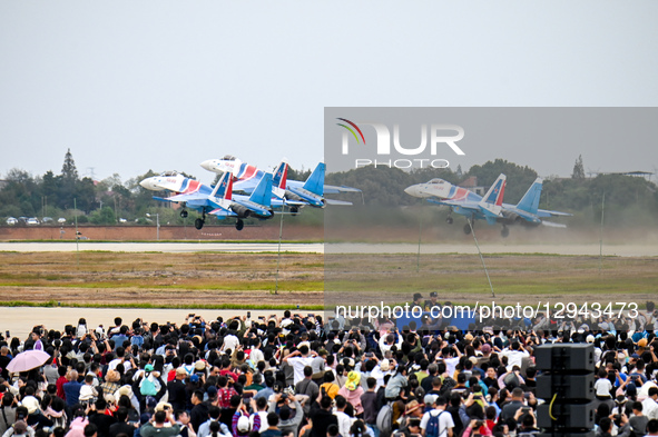 The Russian ''Warriors'' aerobatic demonstration team performs stunt flying at Yaohu Airport in Nanchang, Jiangxi Province, China, on Novemb... by Costfoto/NurPhoto