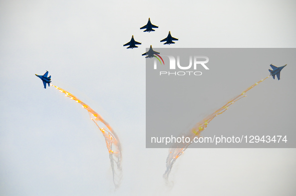 The Russian ''Warriors'' aerobatic demonstration team performs stunt flying at Yaohu Airport in Nanchang, Jiangxi Province, China, on Novemb... by Costfoto/NurPhoto