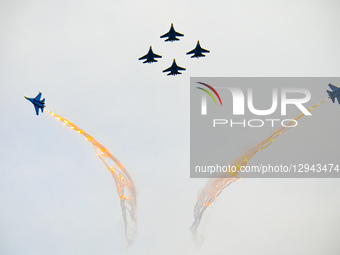 The Russian ''Warriors'' aerobatic demonstration team performs stunt flying at Yaohu Airport in Nanchang, Jiangxi Province, China, on Novemb... by Costfoto/NurPhoto