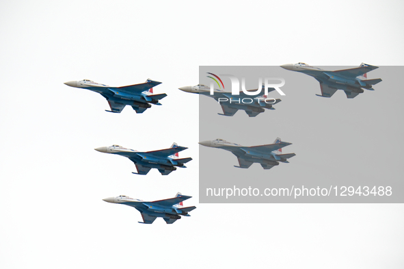 The Russian ''Warriors'' aerobatic demonstration team performs stunt flying at Yaohu Airport in Nanchang, Jiangxi Province, China, on Novemb... by Costfoto/NurPhoto