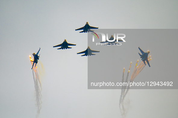 The Russian ''Warriors'' aerobatic demonstration team performs stunt flying at Yaohu Airport in Nanchang, Jiangxi Province, China, on Novemb... by Costfoto/NurPhoto