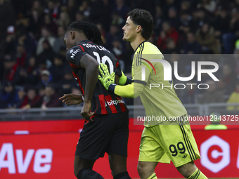 Rafael Leao and Mile Svilar play during the Serie A match between AC Milan and AS Roma at Giuseppe Meazza stadium in Milano, Italy, on Novem... by Mairo Cinquetti/NurPhoto