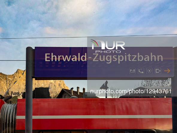 A red DB Regio train is at the Ehrwald Zugspitzbahn station platform in Ehrwald, Tyrol, Austria, on November 1, 2025. The station provides e... by Michael Nguyen/NurPhoto