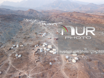 An aerial view shows makeshift tents sheltering displaced Yemeni families who flee their homes due to the ongoing war and conflict with Hout... by Mohammad Daher/NurPhoto