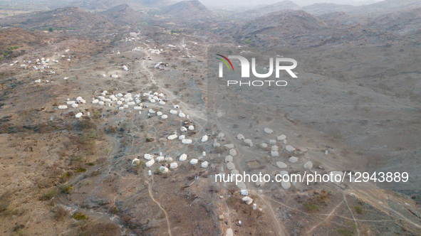 An aerial view shows makeshift tents sheltering displaced Yemeni families who flee their homes due to the ongoing war and conflict with Hout... by Mohammad Daher/NurPhoto