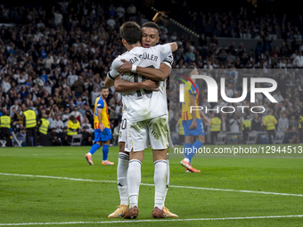 Kylian Mbappe of Real Madrid celebrates his goal with Arda Guler of Real Madrid during the LaLiga EA Sports football match between Real Madr... by Alberto Gardin/NurPhoto