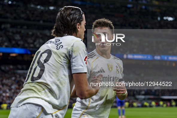 Alvaro Carreras of Real Madrid talks with Arda Guler of Real Madrid during the LaLiga EA Sports football match between Real Madrid CF and Va... by Alberto Gardin/NurPhoto