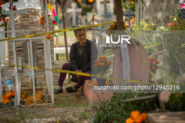 People attend the Municipal Cemetery to keep vigil and decorate the graves of their deceased loved ones on the Day of the Dead in Queretaro,... by Eyepix/NurPhoto