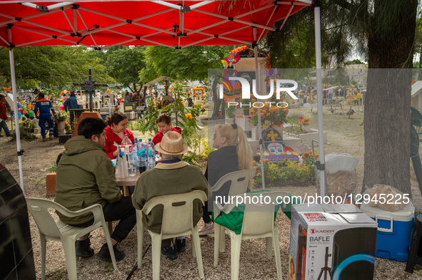 People attend the Municipal Cemetery to keep vigil and decorate the graves of their deceased loved ones on the Day of the Dead in Queretaro,... by Eyepix/NurPhoto