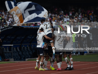 Pumas UNAM teammates celebrate the Rodrigo Lopez goal during the 16th round match of the Liga MX between Pumas UNAM and Club Xolos at the Ol... by Eyepix/NurPhoto