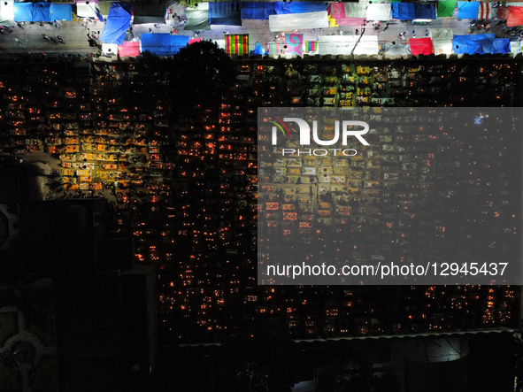 An aerial view of the San Andres Mixquic cemetery, located in Tlahuac, shows people accompanying their deceased loved ones in the traditiona... by Eyepix/NurPhoto