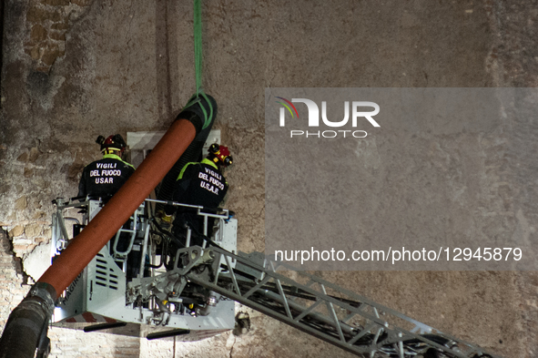 Firefighters work at the site after a section of the Torre dei Conti collapses near the Imperial Forum in Rome, Italy, on November 3, 2025.... by Andrea Ronchini/NurPhoto