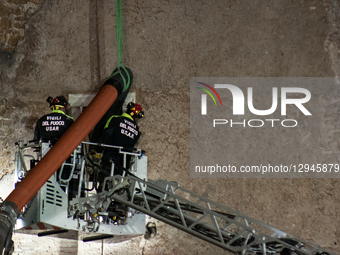 Firefighters work at the site after a section of the Torre dei Conti collapses near the Imperial Forum in Rome, Italy, on November 3, 2025.... by Andrea Ronchini/NurPhoto