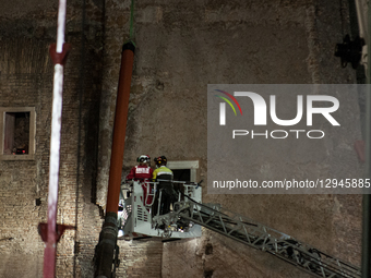 Firefighters work at the site after a section of the Torre dei Conti collapses near the Imperial Forum in Rome, Italy, on November 3, 2025.... by Andrea Ronchini/NurPhoto