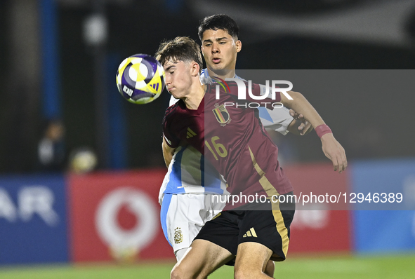 OJEDA Uriel of Argentina and WINS Axl of Belgium are in action during the FIFA U-17 World Cup Qatar 2025 Group D match between Argentina and... by Noushad Thekkayil/NurPhoto