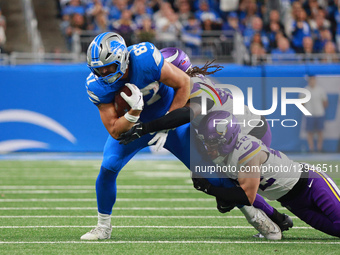 DETROIT,MICHIGAN-NOVEMBER 2: Detroit Lions tight end Sam LaPorta #87 runs the ball during the second half of an NFL football game between th... by Jorge Lemus/NurPhoto