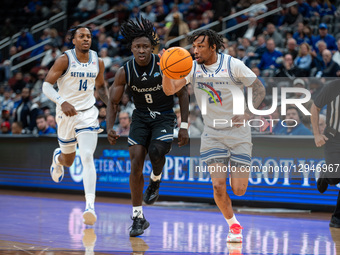 Mike Williams, 23, drives the ball for the Seton Hall Pirates during an NCAA basketball game at Prudential Center in Newark, United States,... by Dan Squicciarini/NurPhoto