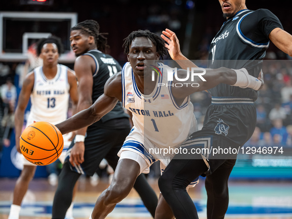 Jacob Dar drives the ball for the Seton Hall Pirates during an NCAA basketball game at Prudential Center in Newark, United States, on Novemb... by Dan Squicciarini/NurPhoto