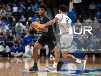 TJ Robinson dribbles the ball for the Seton Hall Pirates during an NCAA basketball game at Prudential Center in Newark, United States, on No... by Dan Squicciarini/NurPhoto