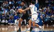 TJ Robinson dribbles the ball for the Seton Hall Pirates during an NCAA basketball game at...