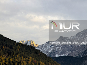 The snow-dusted peaks of the Zugspitz massif and Wetterstein Mountains are in Ehrwald, Tyrol, Austria, on November 1, 2025. The Alpine lands... by Michael Nguyen/NurPhoto