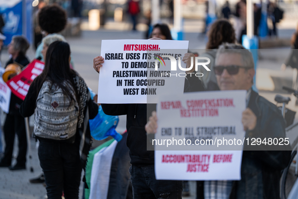 Dozens of pro-Palestinian activists protest with signs at the entrance to the Fira venue, where the Smart City Congress is held, in Barcelon... by Marc Asensio/NurPhoto