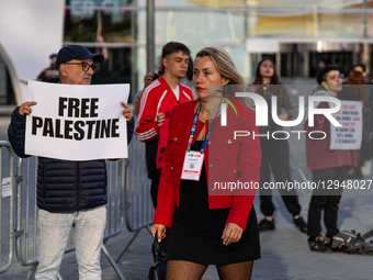 Dozens of pro-Palestinian activists protest with signs at the entrance to the Fira venue, where the Smart City Congress is held, in Barcelon... by Marc Asensio/NurPhoto
