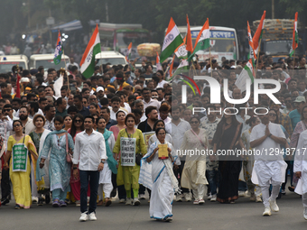 Trinamool Congress (TMC) party's chairperson and India's West Bengal state chief minister Mamata Banerjee holds the India Constitution book... by Debajyoti Chakraborty/NurPhoto