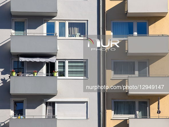 The facades of mid-rise residential apartment buildings line a busy street in Munich, Bavaria, Germany, on November 4, 2025. Due to high dem... by Michael Nguyen/NurPhoto