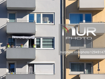 The facades of mid-rise residential apartment buildings line a busy street in Munich, Bavaria, Germany, on November 4, 2025. Due to high dem... by Michael Nguyen/NurPhoto