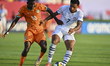 Aboubacar MEITE of Cote d'Ivoire and Giacomo KOLOTO of Switzerland are in action during th...