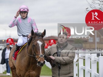 FIRE EYES (FR), ridden by Oisin McSweeney and trained by Roger Fell, enters the winner's enclosure after finishing first during Race 8 - 15:... by MI News/NurPhoto