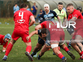 In Krakow, Poland, on November 2, 2025, Michal Jurczynski of Juvenia Krakow is challenged by Jan Mrozinski of Energa Ogniwo Sopot during the... by Klaudia Radecka/NurPhoto